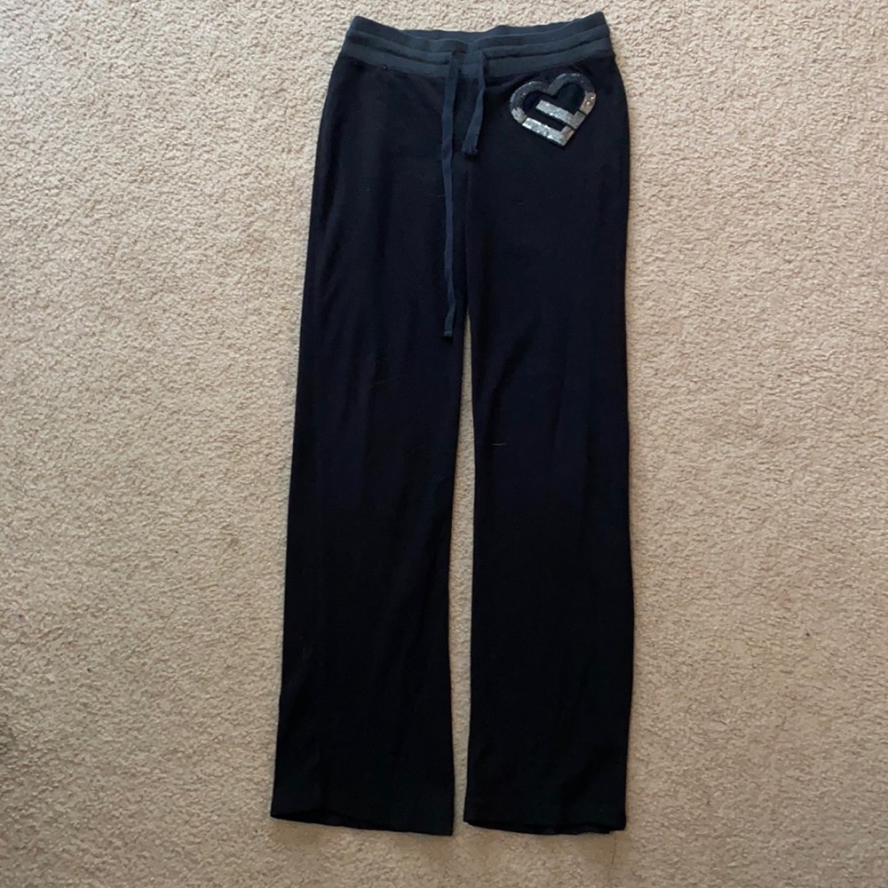 Black sweatpants with glitter heart
